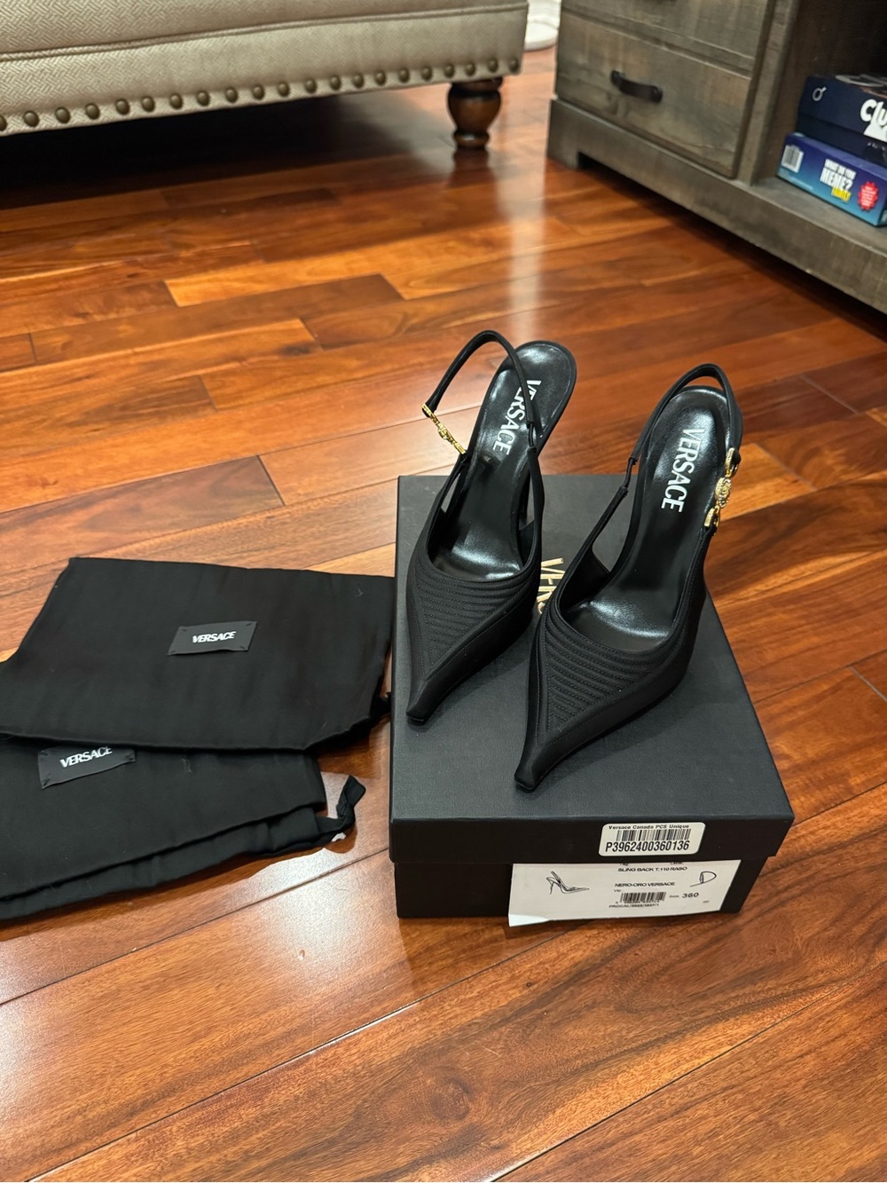 Versace Black Pointed Slingback Heels with Gold Medusa Accent